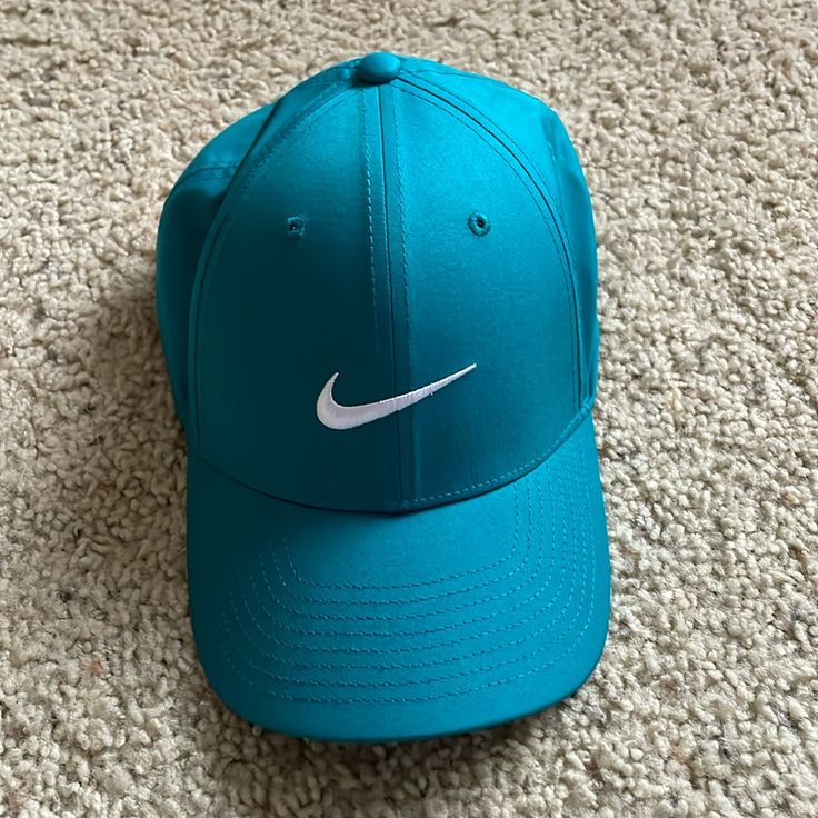 Never Worn! Teal Nike Dri Fit Hat Casual Blue Golf Hat, Nike Cap For Spring, Nike Snapback Hats For Spring, Nike Spring Cap, Nike Adjustable Spring Hats, Casual Turquoise Cap, Casual Turquoise Cap Hat, Blue Beach Visor Hat, Blue Short Brim Baseball Cap For Spring