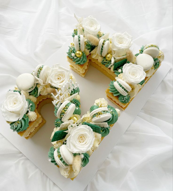 there are two pieces of cake with flowers on them