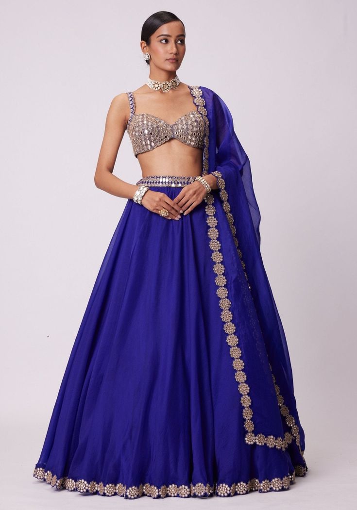 Blue Organza Lehenga With Embroidered Sleeveless Gold Blouse Vvani by Vani Vats - Fabilicious Fashion Blue Organza Lehenga, Blue Organza, Organza Lehenga, Mirror Embroidery, Weddings Receptions, Outfits Woman, Blue Lehenga, Persian Blue, Embroidered Lehenga