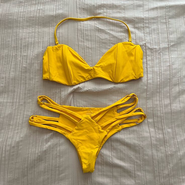 Bikini From Poema Swim Color - Mango Top - Small (No Tag) Bottoms - Xs Very Soft And Stretchy Fabric Strap Is Removable On The Top So It Can Can Be Worn Strapless Nearly Brand New, Only Worn Once Yellow Strappy Swimwear For Vacation, Yellow Strappy Swimwear For Poolside, Yellow Strappy Swimwear For The Beach, Yellow Strappy Swimwear For Beach, Yellow Strappy Swimwear For Summer, Yellow Strappy Summer Swimwear, Yellow Party Swimwear For Beach Season, Yellow Underwire Swimwear For Beach, Yellow Summer Party Swimwear