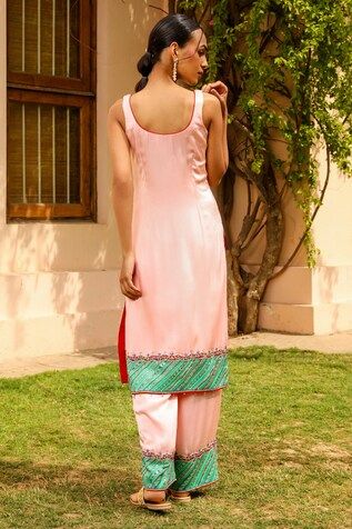 Baby pink straight kurta featuring floral hand embroidered neck and hemline. Paired with a co-ordinating pant. - Aza Fashions Sleeveless Salwar Kameez With Resham Embroidery, Summer Palazzo Set With Embroidered Border, Spring Salwar Kameez With Dori Work, Pink Sleeveless Salwar Kameez With Resham Embroidery, Traditional Sleeveless Salwar Kameez With Floral Embroidery, Pink Sleeveless Traditional Wear With Resham Embroidery, Fitted Pink Palazzo Set With Floral Embroidery, Designer Dori Work Palazzo Set For Summer, Designer Summer Palazzo Set With Dori Work