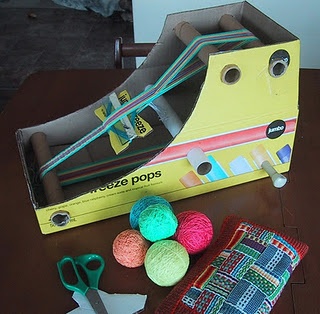 crochet supplies are sitting on a table next to a sewing kit and scissors