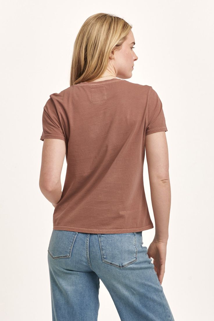 Short sleeve jersey tee, v-neck with self neck band & patch labeling in vintage garment dye wash. Solid color knit on relaxed fit. Stylish simple classic washed flawlessly, the essential pairing for your lifestyle...Body length from HPS: 23 1/2", Sleeve length: 6 1/2", Bust: 37" (Size Small) 100% COTTON Machine wash cold, Tumble dry low Imported Relaxed Fit V-neck T-shirt For Casual Gatherings, Soft-washed Relaxed Fit V-neck Tops, Washed Organic Cotton Short Sleeve Tops, Short Sleeve Washed Organic Cotton Tops, Basic Washed Organic Cotton Tops, Casual Cotton V-neck T-shirt, Relaxed Fit V-neck Top For Casual Gatherings, Casual Brown V-neck Top, Casual V-neck T-shirt For Gatherings