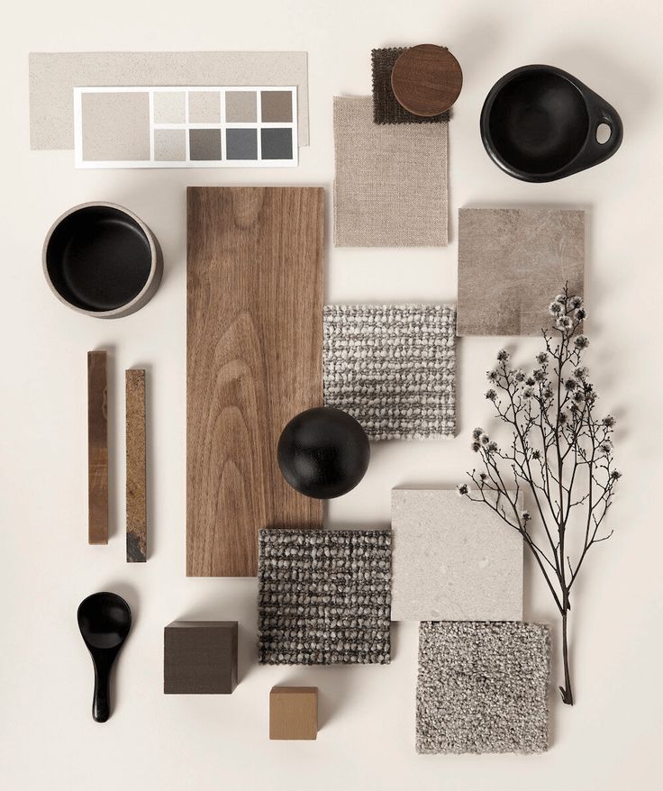 an assortment of different materials are arranged on a white surface, including black and brown objects