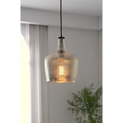 Cast a warm and welcoming glow in the foyer or bring a bit of brightness to your kitchen island with this one-light large glass pendant, which is compatible with sloped ceilings. Suspended from a black cable and secured with a black socket, its downward-facing glass shade showcases hammered glass for fun flair and accommodates one bulb of up to 60 W (not included). Assembly and installation are required for this hardwired luminary. Trent Austin Design® Finish: Silver | Trent Austin Design® Kettn Oil Rubbed Bronze Pendant Light Kitchen, Large Pendant Lights Over Kitchen Island, Lights Above Kitchen Island, Glass Island Pendant Lights, Mercury Glass Pendant Light, Oil Rubbed Bronze Pendant Light, Lights Over Island, Large Glass Pendant, Lights Over Kitchen Island