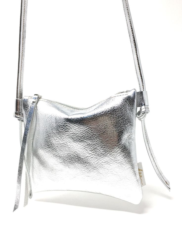 Silver Shoulder Bag With Mobile Phone Bag For Everyday, Silver Leather Shoulder Bag As Gift, Silver Leather Shoulder Bag For Gift, Silver Soft Leather Shoulder Bag For Evening, Silver Bag With Adjustable Strap As Gift, Everyday Silver Shoulder Bag In Soft Leather, Silver Shoulder Bag With Detachable Strap For Everyday Use, Silver Soft Leather Shoulder Bag For Travel, Silver Clutch Shoulder Bag For Everyday