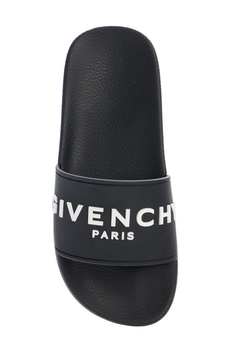 A dimensional Givenchy logo stands out on the wide strap of a laid-back slide sandal grounded with a star-studded sole. Synthetic upper, lining and sole Made in Italy Men's Designer Shoes Luxury Slides With Removable Insole, Leather Slides With Studded Rubber Outsoles, Designer Slides For Summer, Designer Cushioned Slides Slip-on, Designer Cushioned Slip-on Slides, Luxury Black Slide Sandals, Summer Slip-on Slides With Embossed Logo, Summer Slides With Embossed Logo, Luxury Summer Slides With Rubber Sole