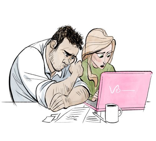 a man and woman are looking at a laptop screen while they look at the screen