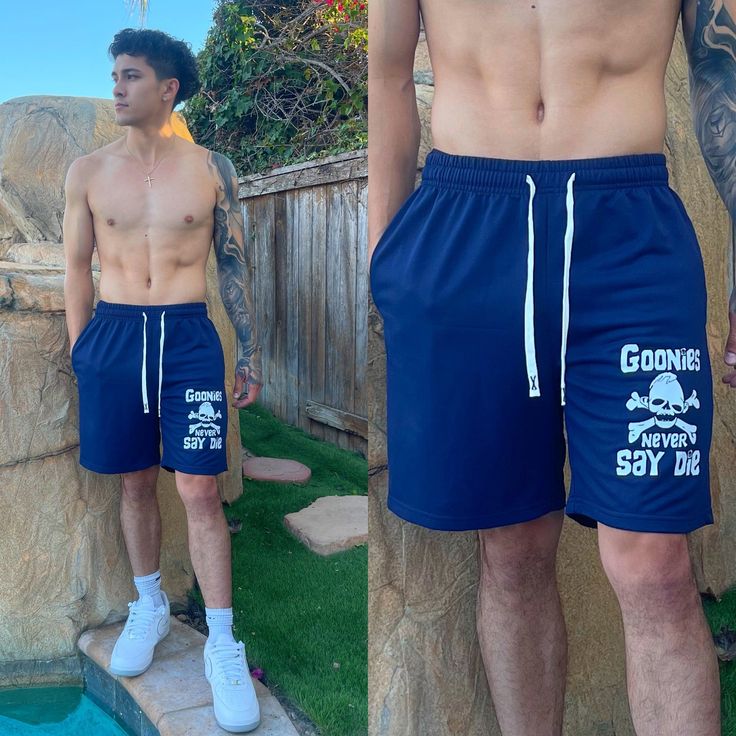 Navy Blue Goonies Sweat Shorts 💀 with "Never Say Die" design, stretch waistband, white drawstring, and dual side pockets. Made of extra soft, breathable fabric. To preserve quality of this product, avoid heat on design. Made of 100% Polyester. Return Policy: 14 day money back guarantee on all items if item doesn't fit. Trying on an item for fit is allowed. As long as item is not damage, free return shipping is included. See returns and exchanges policy for exceptions and details. For questions Goonies, Sweat Shorts, Breathable Fabric, Return Policy, Navy Blue, Heat, Money, Navy, Fabric