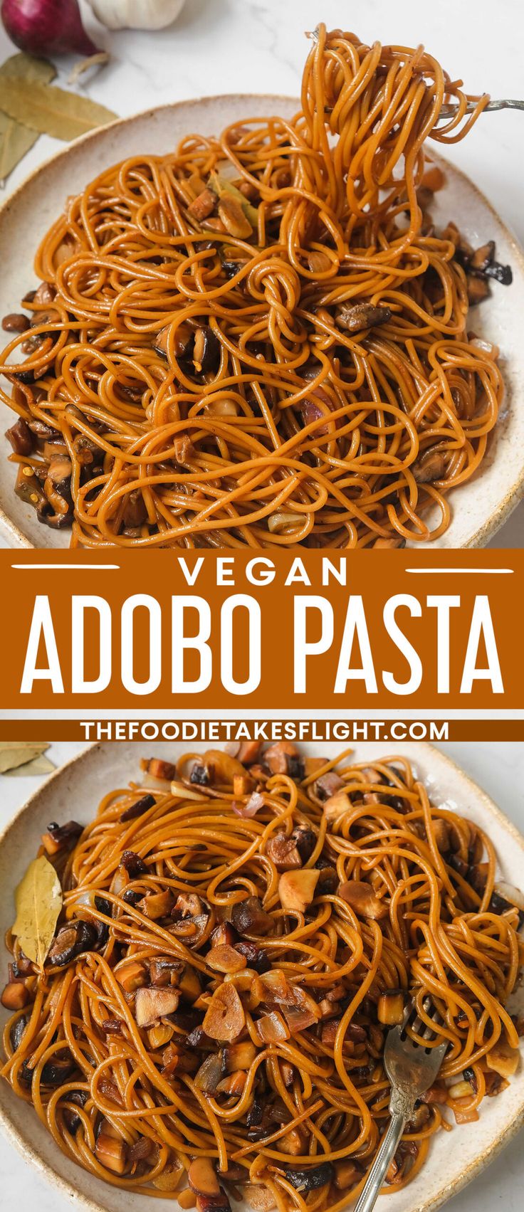 two plates filled with vegan adobo pasta on top of a white table