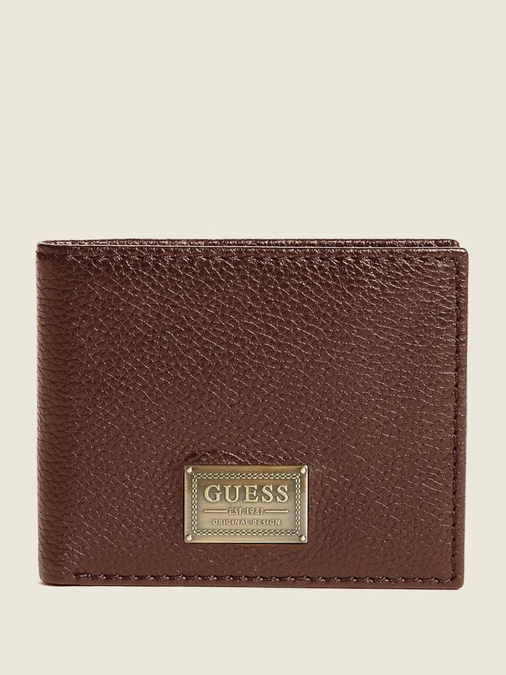 Faux-leather bifold wallet featuring a logo patch detail and interior flap with card slots for easy organization. Leather Bifold Wallet With Logo, Classic Rectangular Wallet With Logo, Brown Rectangular Wallet With Logo, Brown Wallets With Logo For Everyday Use, Leather Bifold Wallet With Embossed Logo, Classic Wallets With Logo For Everyday Use, Guy Accessories, Random Guy, Guess Watch