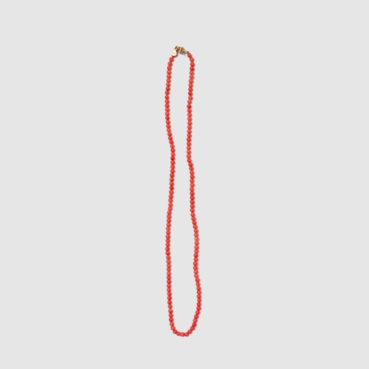 PINK BAMBOO CORAL BRUJERÍA NECKLACE - Beatricevalenzuela.com Formal Coral Single Strand Beaded Necklace, Formal Single Strand Red Coral Necklace, Elegant Red Long Necklace With Round Beads, Elegant Red Coral Necklaces With Polished Beads, Classic Coral Round Jewelry, Classic Round Coral Jewelry, Elegant Single Strand Red Coral Necklaces, Elegant Hand-strung Coral Necklaces, Elegant Coral Hand-strung Necklaces