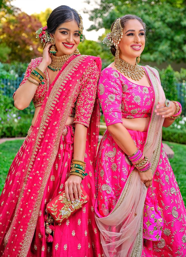 Add a small burst of shade for your wardrobe with this sensual hot pink colored silk lehenga choli. The lehenga is beautified with sequin embellishments which makes this attire look even more chic ! Color -Hot Pink Fabric & Work Style -- Silk lehenga with sequin embellishments.- blouse with sequin embellishments. Details -- Assured quality.- Wash care instruction: Dry clean only.- Slight variation in color is possible due to digital photography. Pink Lehenga With Gota Work, Pink Anarkali Set With Gota Work For Reception, Pink Choli With Dupatta, Pink Dola Silk Anarkali Set, Pink Raw Silk Dress With Gota Work, Art Silk Lehenga With Chandbali Shape, Pink Gota Work Choli For Reception, Pink Anarkali Choli With Zari Work, Pink Anarkali Pre-draped Saree With Dori Work