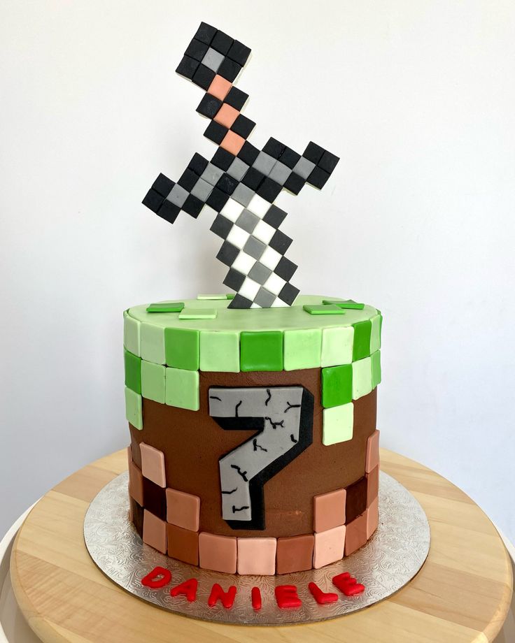 a cake decorated to look like a video game