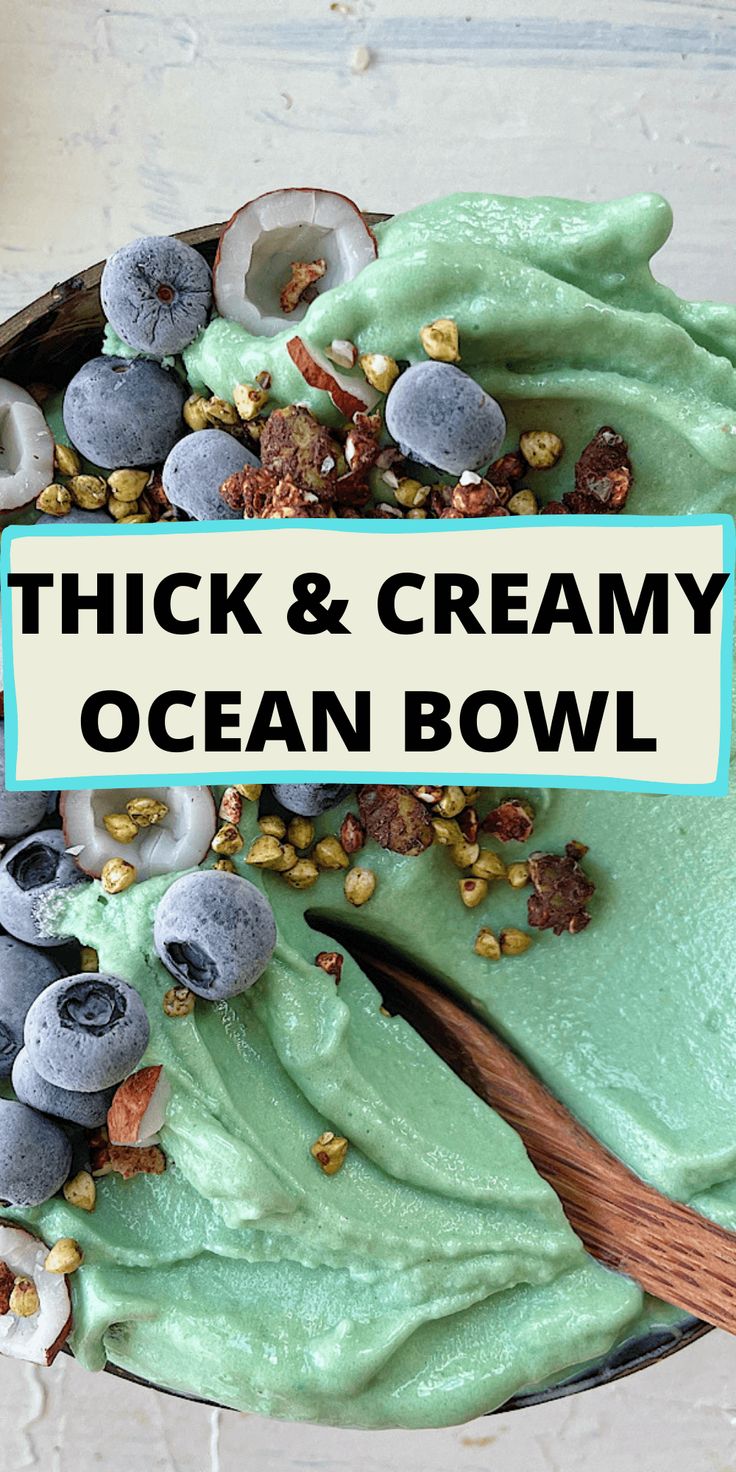 there is a cake with green frosting and blueberries on the top that says thick & creamy ocean bowl