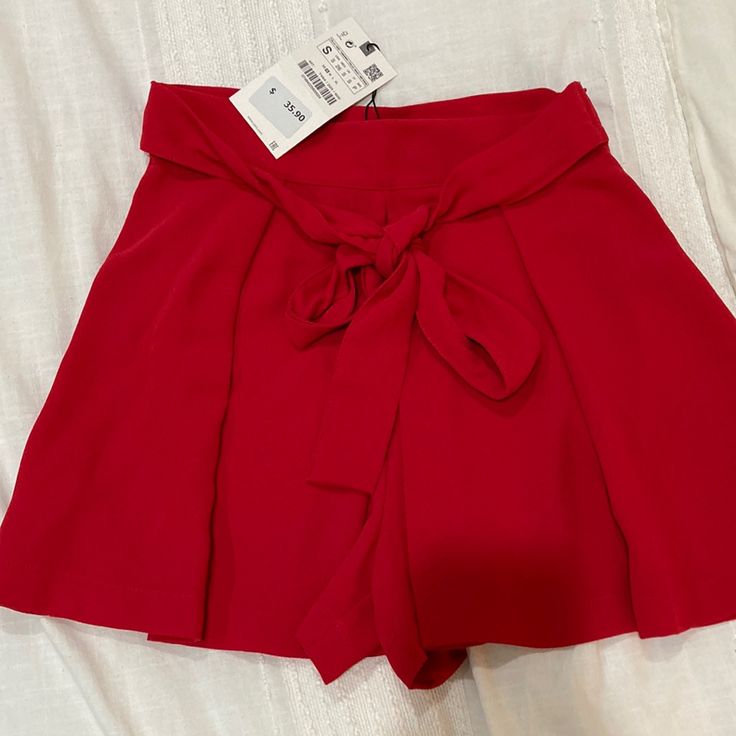 Zara Red Dress Shorts. Never Worn. Side Zip At Waist. Fits True To Size And Sits Mid/High Rise On Waist (Hits Right Above My Belly Button). Size Small. Red High Waist Bottoms For Going Out, Solid Summer Party Shorts, Solid Color Party Shorts For Summer, Chic Red Bottoms For Going Out, Casual Solid Color Shorts For Party, Red High-waisted Shorts For Party, Mini Bottoms For Date Night In Summer, Summer Date Night Mini Bottoms, Chic Red High-waisted Shorts