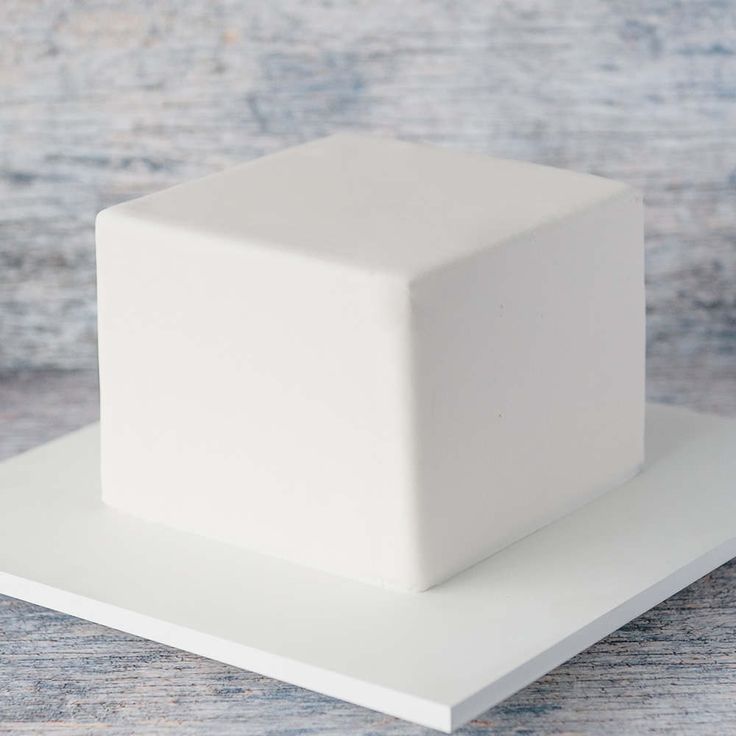 a square white object sitting on top of a table