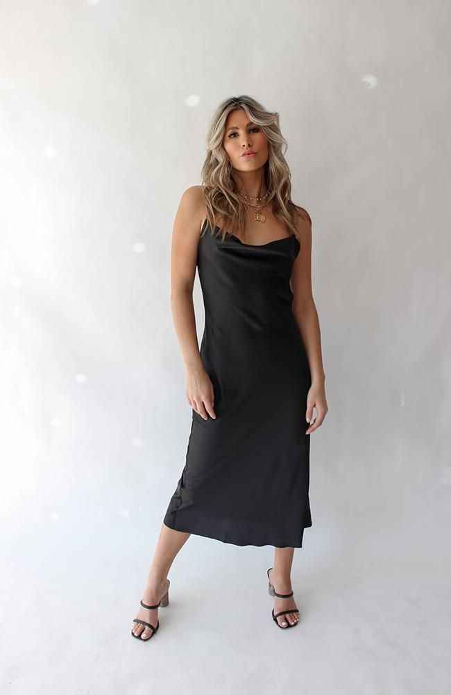 COLOR: BLACK DETAILS Features a satin material, midi length, low back and cowl neckline stretch 92% Polyester, 8% Elastane Please refer to the care label for garment care instructions SIZE & FIT: runs TTS, model wears size S MODEL INFO: HEIGHT 5’6, WAIST 25in, BUST 32in Cowl Neckline, Satin Material, Care Label, Black Midi Dress, Low Back, S Models, Midi Length, One Shoulder Formal Dress, Care Instructions