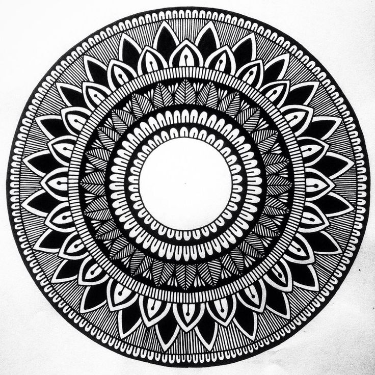 a black and white drawing of a circular object