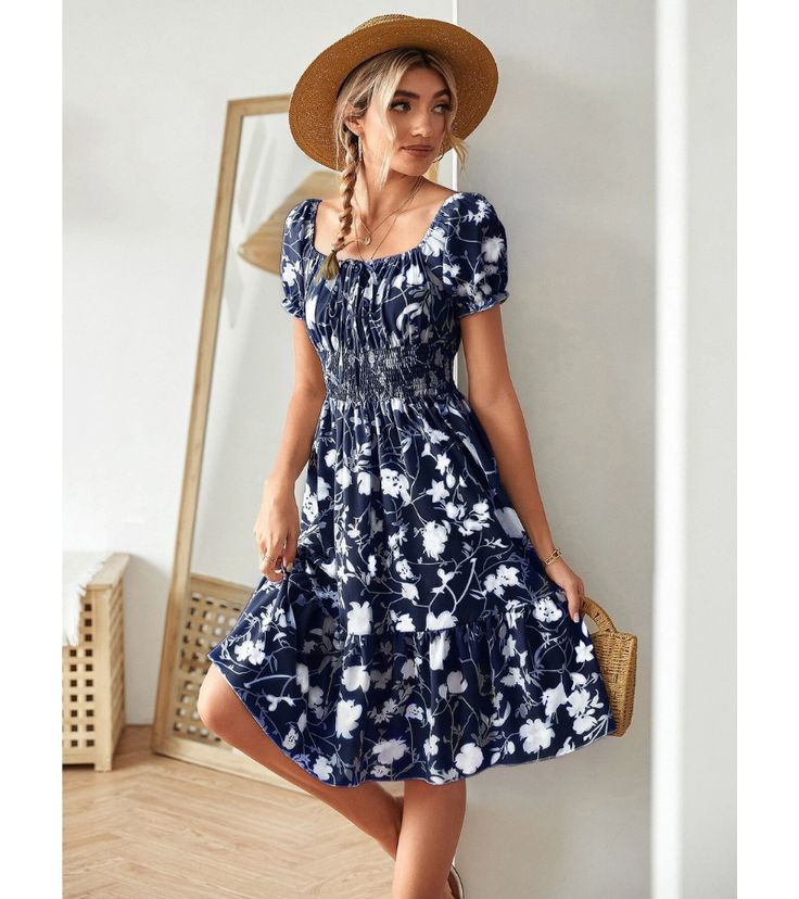 This midi dress features a feminine floral pattern and a smocked waist - perfect for running errands on a warm day or adding to your vacation suitcase. Wear the sleeves over your shoulders to create a square neckline or off the shoulders for a subtly sexy look that will help you stay cool and comfortable. Pair it with white sneakers for a more casual style or heels if you want to elevate your outfit. Size US Length Bust Waist Small 2-4 32.7 35.4 25.2-43.3 Medium 6-8 33.5 37 26.8-44.9 Large 10-12 Spring Knee-length Smocked Dress With Gathered Waist, Short Sleeve Smocked Sundress With Floral Print, Floral Print Short Sleeve Smocked Sundress, Casual Smocked Dress With Ditsy Floral Print Short Sleeve, Casual Smocked Dress With Ditsy Floral Print, Casual Smocked Short Sleeve Dress For Garden Party, Casual Floral Print Midi Dress, Casual Smocked Dress With Short Sleeves For Garden Party, Casual Smocked Square Neck Dress