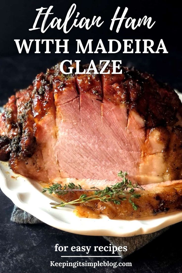 italian ham with madera glaze on a white platter and text overlay reads italian ham with maderia glaze for easy recipes