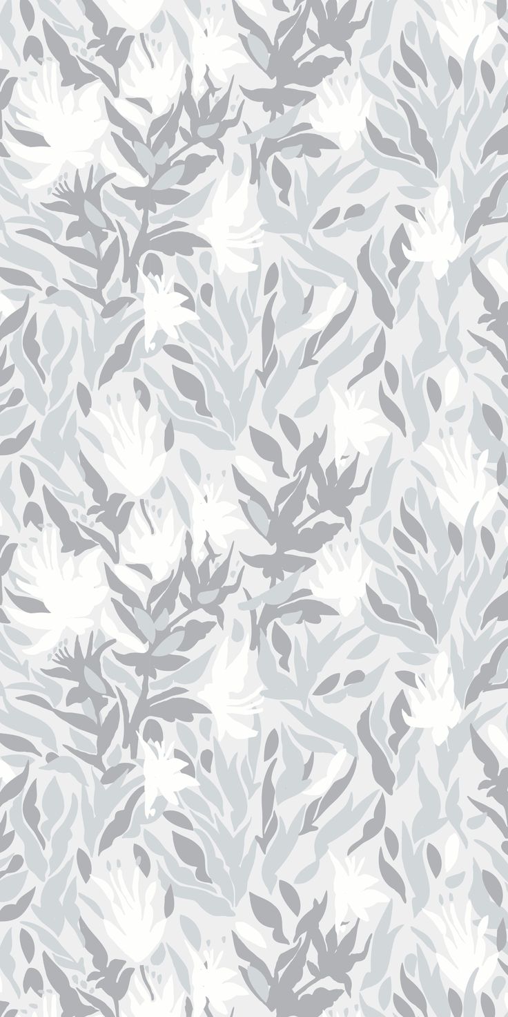 a gray and white pattern with leaves on it