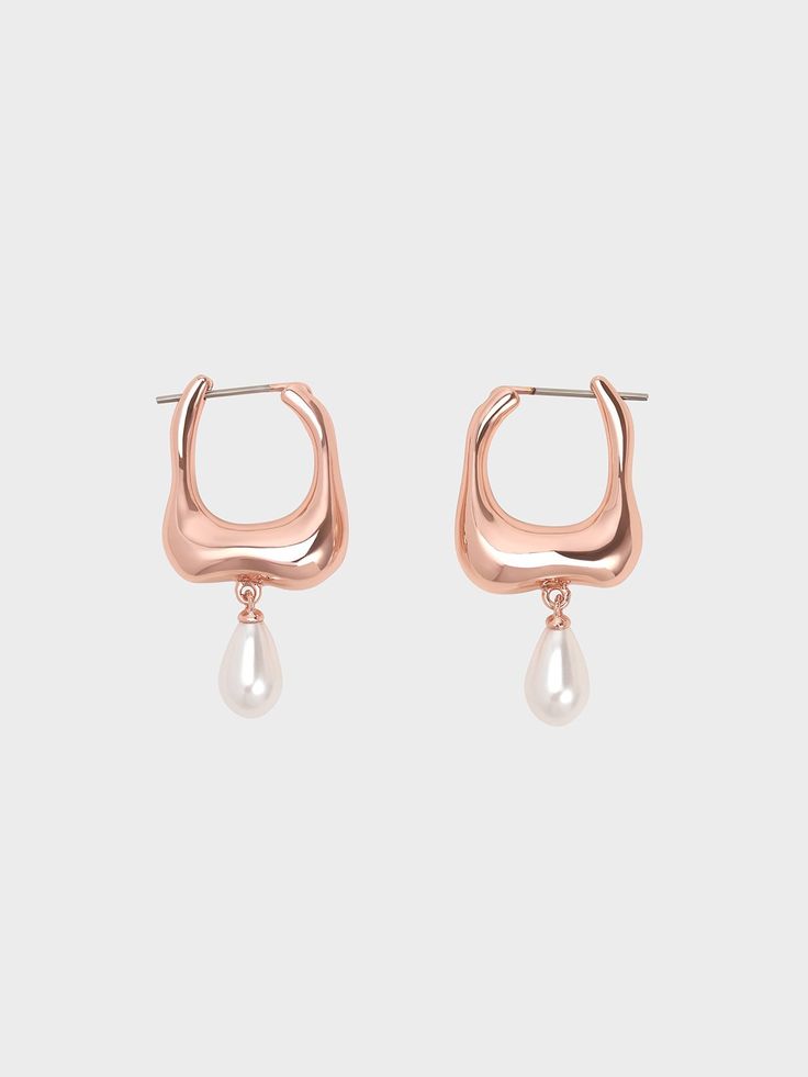 Pearls are having a moment in fashion right now -- these rose gold-tone Corrine teardrop pearl hoop earrings are definitely worthy additions to your jewellery collection. Bold and sophisticated, they make a quiet statement, and will elevate the simplest everyday outfit in an instant. Luminous faux teardrop pearls hang off thick sculptural gold-tone hoops to create a design that is classy, feminine and edgy at the same time. Bottega Earrings, Classy Feminine, Pearl Hoop Earrings, Charles Keith, Everyday Outfit, Rose Gold Earrings, Jewellery Collection, Everyday Outfits, Jewelry Collection