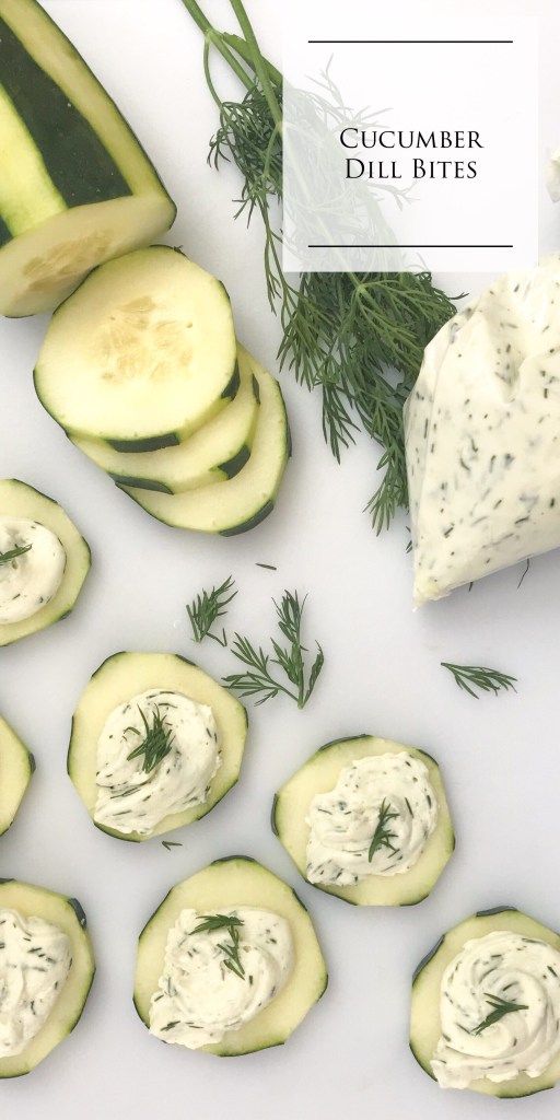 cucumber dill bites with cream cheese and herbs on the side next to them