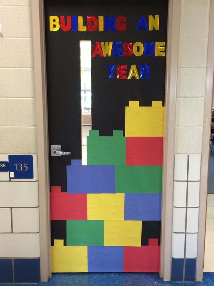 a door decorated with lego blocks and the words building an awesome year