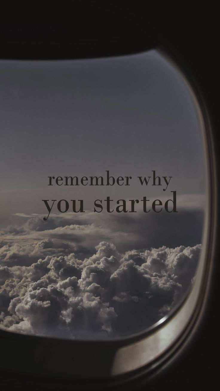 an airplane window with the words,'remember why you started'in black and white