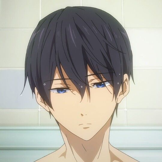 an anime character with blue eyes and black hair in front of a white tiled wall