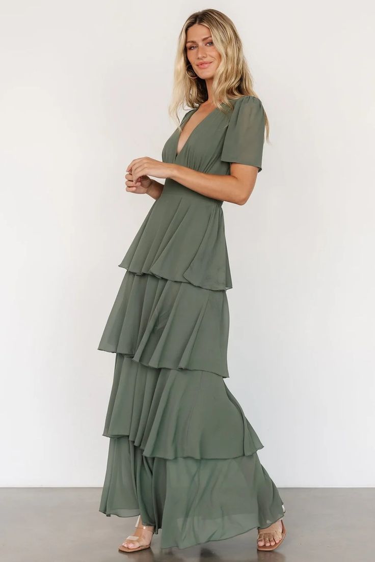 Our Montaigne Maxi Dress is perfect for dancing! Get her for your next event and show off your moves! Ruffle Bridesmaid Dress, Maxi Dress Dark, Cocktail Jumpsuit, Dress Rich, Sage Green Bridesmaid Dress, Destination Dress, Dark Sage, Ruffle Maxi Dress, Baltic Born