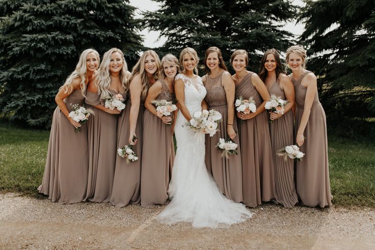 a group of women standing next to each other