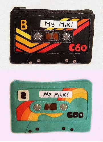 there are two patches that have different designs on them, one has a tape recorder and the other has a cassette