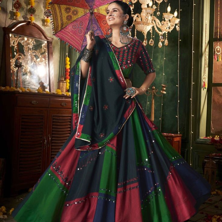 Celebrate Navratri in style with this beautifully crafted Muslin Cotton Lehenga Choli set, designed to make you stand out during festive occasions. This ready-to-wear outfit features intricate mirror work and printed embroidery, perfect for traditional celebrations. Key Features: Lehenga: Muslin Cotton fabric with printed mirror work, ensuring a comfortable yet festive look. Lehenga Size: Waist 42 inches, Length 40 inches—designed for a comfortable fit. Blouse: Muslin Cotton with printed thread Navratri Ghagra, Navratri Lehenga, Garba Dress, Mirror Work Lehenga, Cotton Lehenga, Mirror Work Blouse, Navratri Chaniya Choli, Navratri Special, Ghagra Choli