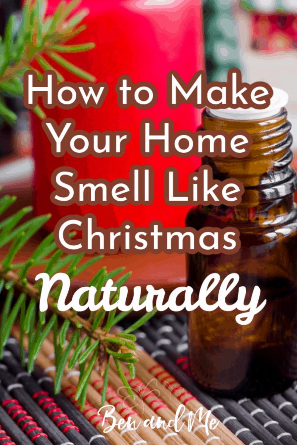 a bottle of essential oils next to some cinnamon sticks and pine needles with the words how to make your home smell like christmas naturally