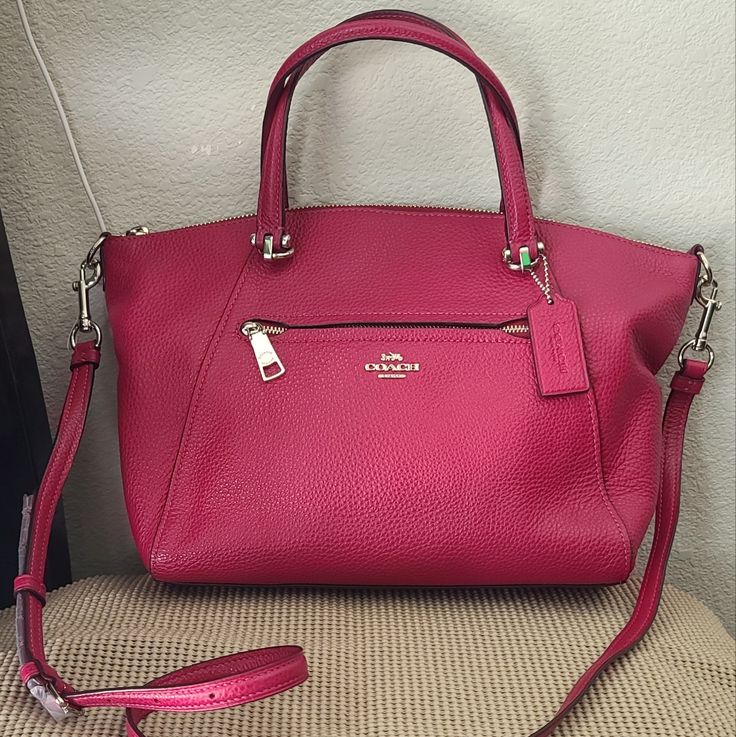 Nwot Coach Dark Pink/Magenta Pebbled Leather Convertible Crossbody Bag. Adjustable Removable Strap Drops 22". Handle Drops 5". Handheld Pink Leather Satchel, Classic Pink Satchel With Top Carry Handle, Classic Pink Satchel With Top Handle, Classic Pink Satchel With Removable Pouch, Classic Pink Satchel With Detachable Strap, Pink Leather Crossbody Satchel, Coach Pink Crossbody Satchel, Pink Coach Satchel With Top Carry Handle, Coach Pebbled Leather Satchel Bag