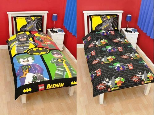 two beds with batman themed comforters on them