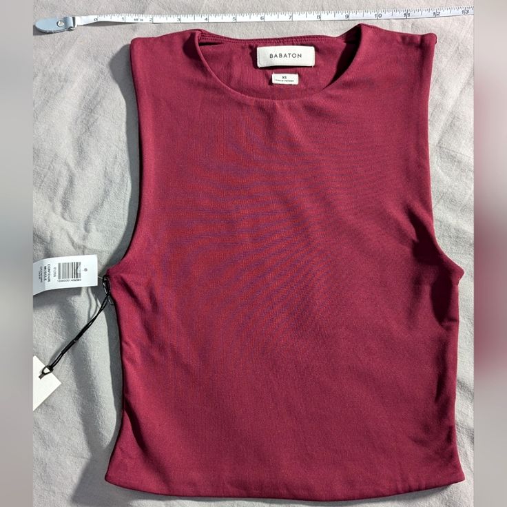 Tank With A High Crew Neckline And Double-Layer Fabric For A Smooth And Structured Fit Never Worn, Burgundy Wine Muscle Tank Top. Very Soft And Stretchy. Irons Well. 12" Across Chest 16" Length Shoulder To Hem Content: 94% Nylon, 6% Elastane Chic Purple Sleeveless Crop Top, Purple Fitted Sleeveless Top, Fitted Sleeveless Purple Top, Purple Fitted Cropped Tank Top, Fitted Cropped Purple Tank Top, Fitted Purple Cropped Tank Top, Blue Cami, Black Cami Top, Small Tank Tops