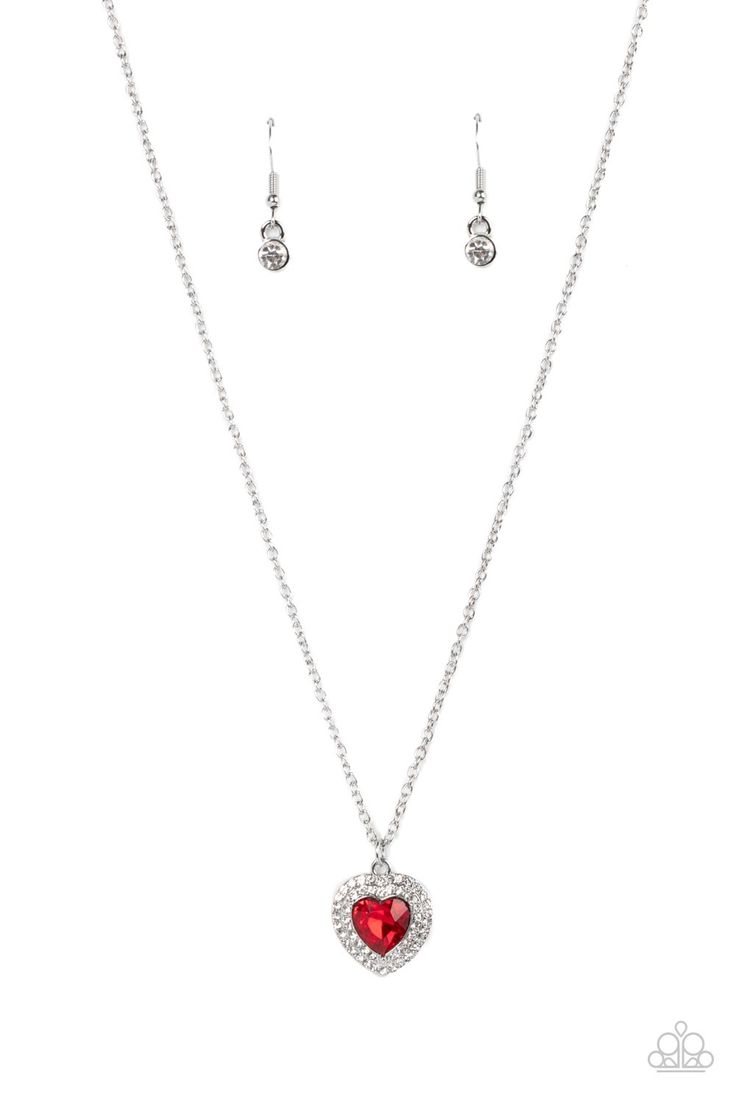 Bordered in stacked rows of glassy white rhinestones, a fiery red heart shaped gem sparkles at the center of a dainty silver chain for a flirtatious fashion. Features an adjustable clasp closure.

 Sold as one individual necklace. Includes one pair of matching earrings. Red Heart Necklace, Happy Jewelry, Stackable Bangles, Red Necklace, Heart Frame, Paparazzi Accessories, Fiery Red, White Rhinestone, Silver Bars