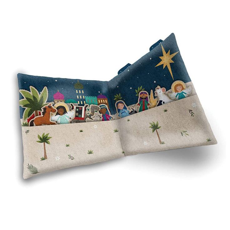 the nativity scene is depicted in this decorative pillow