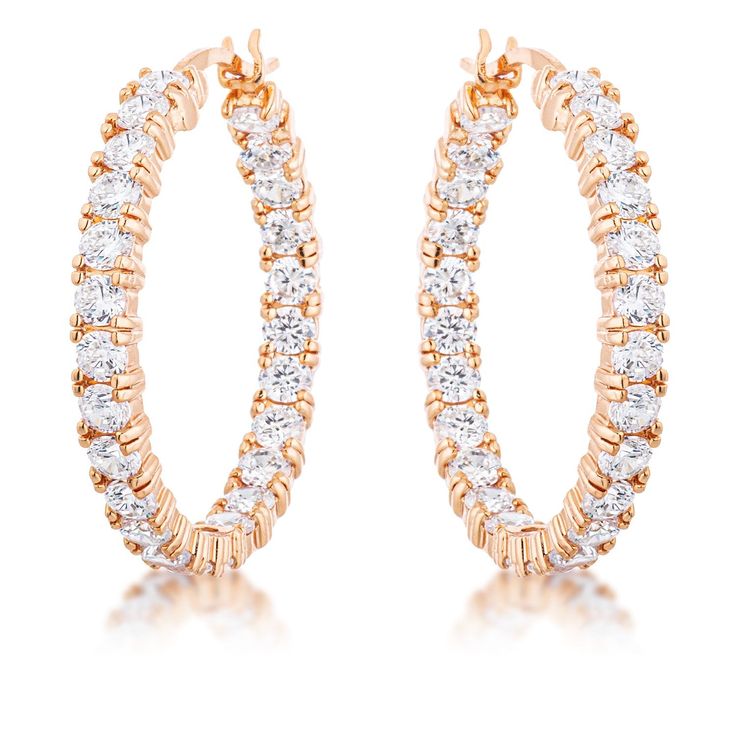 The possibilities are endless with these inside and outside channel set round cubic zirconia 18k rose gold plated eternity hoop earrings. They match almost anything subtle enough to wear everyday but beautiful enough to make you shine. Setting Type: Prongs Stone Size: 4 Mm Stone Cut: Round Carat Weight: 5.5 (ct) Rose Gold Diamond Hoop Earrings, Cubic Zirconia Hoop Earrings, Gold Diamond Hoop Earrings, Rose Gold Hoop Earrings, Inside And Outside, Diamond Hoop Earrings, Channel Set, Fine Jewelry Gift, Rose Earrings