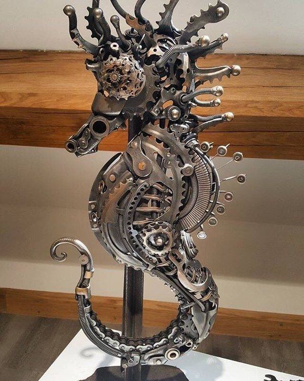 a metal sculpture is on display in a room