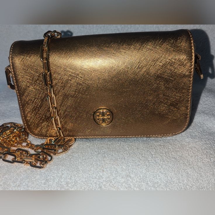 Reposhing This Item I Purchased From @Natvrd. Loved It, But Ready To Rotate For Something New. Questions? Leave A Comment Below! Gold Crossbody Bag, Belt Purse, Tory Burch Bags, Tory Burch Bag, Leave A Comment, Something New, Crossbody Bags, Tory Burch, Belts