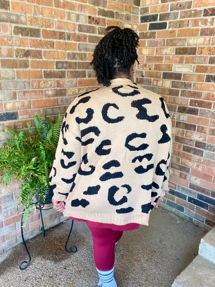 Tan/Light Brown Color, Sweater, knit material. Black leopard print. Long sleeves Light Brown Color, Leopard Print Cardigan, Color Sweater, Black Leopard Print, Skirt Jumpsuit, Trendy Tee, Black Leopard, Printed Cardigan, Sweater Knit