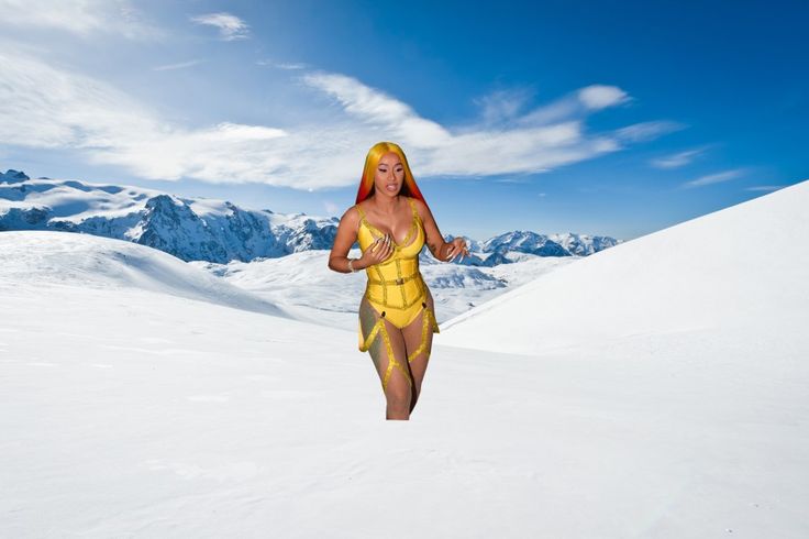 a woman in a yellow costume is running through the snow with mountains in the background