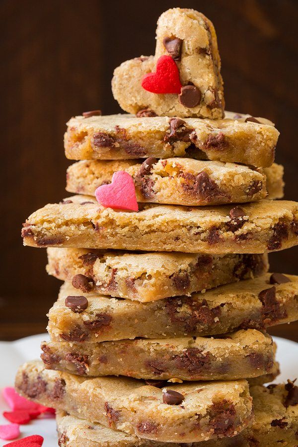 a stack of cookies with hearts on top