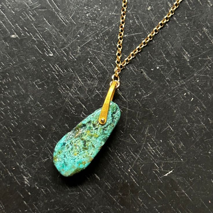 Our December birthstone is TURQUOISE, and once again we have some lovely gemstones to use in our earrings and necklaces! This beautiful, raw Turquoise gemstone is 1 1/4" tall x 9/16" wide x 1/4" thick. It is suspended from our small 24K GOLD VERMEIL Bail, wrapped with 14K gold wire, and it hangs from an 16"/18" adjustable 14K GOLD fill chain. Turquoise is perhaps the oldest decorative stone in mankind's history, the Taliswoman of Kings and Queens, Shamans, and Warriors. It is a stone of protecti Artisan Turquoise Necklace, One Of A Kind, Gift, Rustic Turquoise Hand-strung Necklace, Hand-strung Turquoise Pendant Necklace, Artisan Hand-strung Turquoise Necklace Gift, Spiritual One-of-a-kind Turquoise Pendant Necklace, Raw Turquoise, Jewellery Showroom, Kings And Queens, Throat Chakra