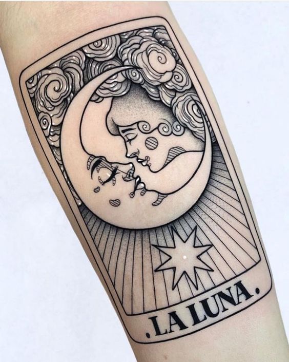 a tattoo on the arm of a woman with a moon and stars in her hand