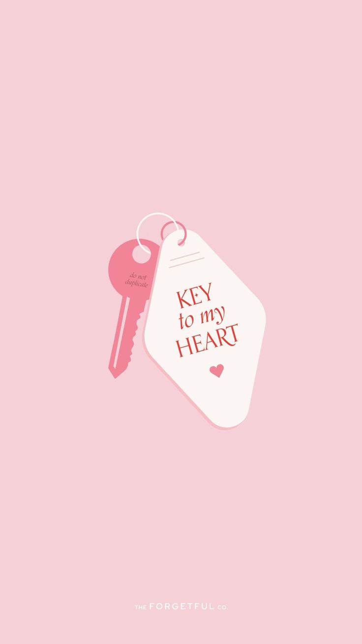 a key to my heart on a pink background